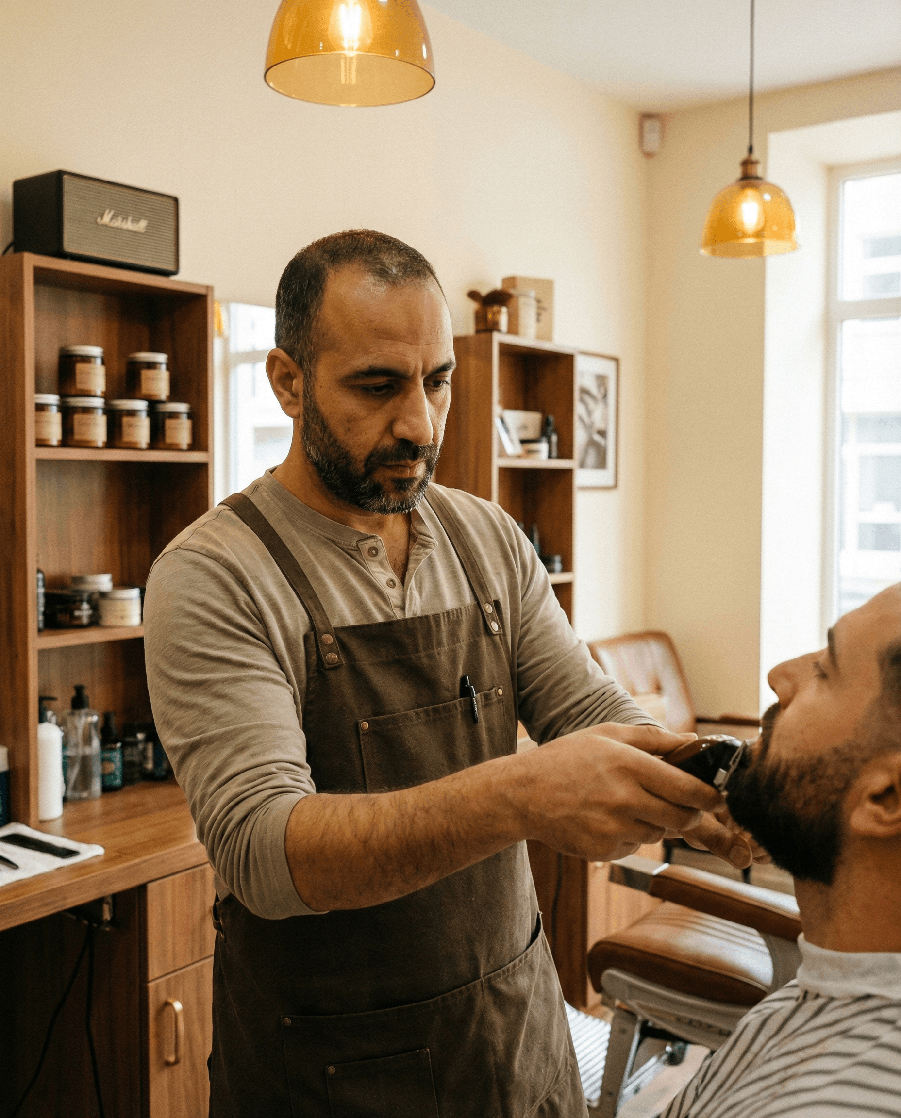 Modern barbershop with warm lighting and classic barber chairs